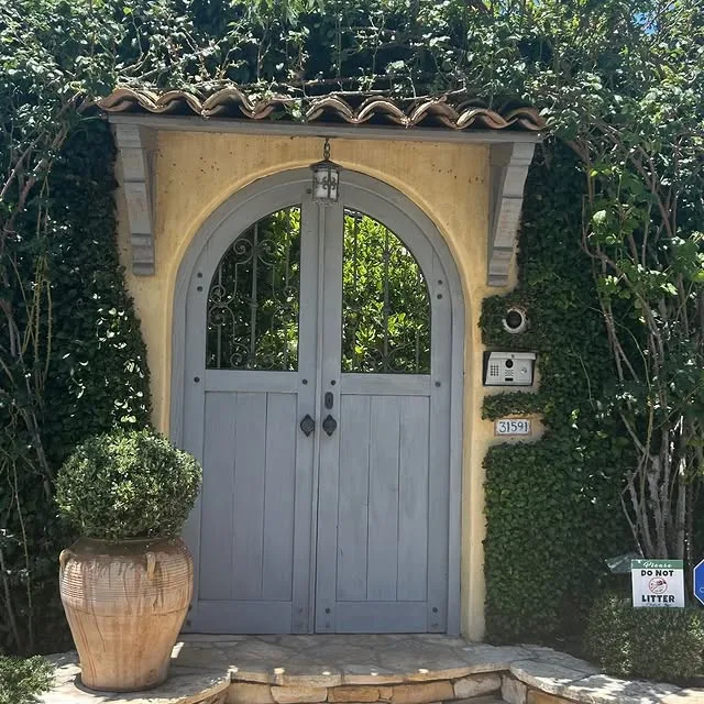 A pretty ivy-covered garden gate in Beverly Hills, California