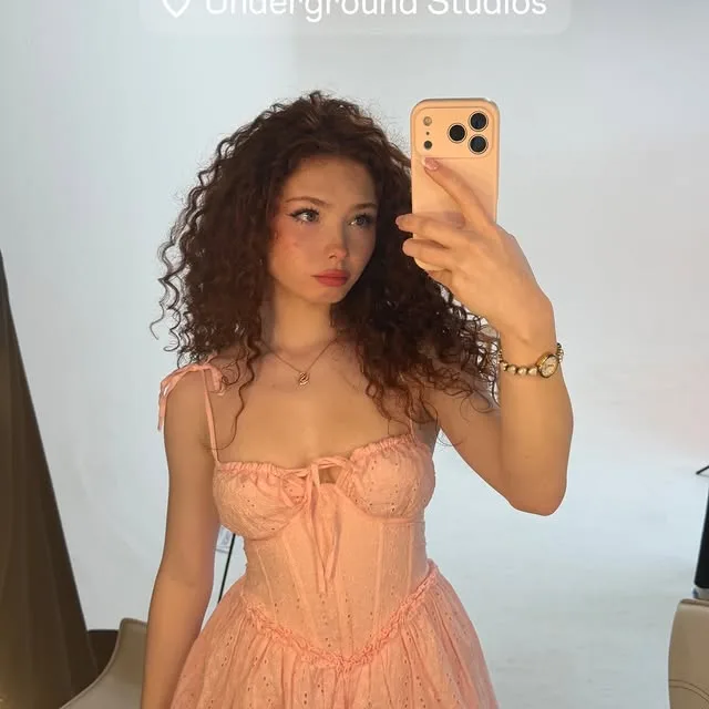 Livia Paige dressed up in a peach corset dress for the Nectar show